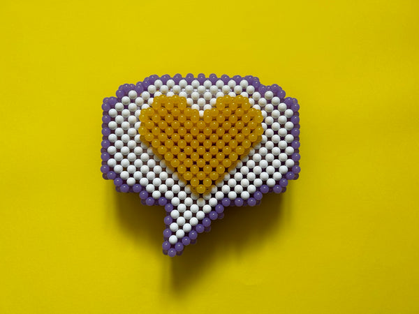 You saw it here first! Laoxa's Speech Bubble Beaded Bag!